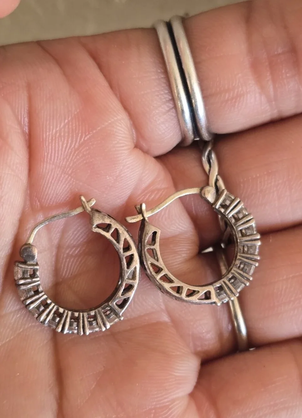 Elegant channel set sparkling CZ diamonds half filigree hoop earrings